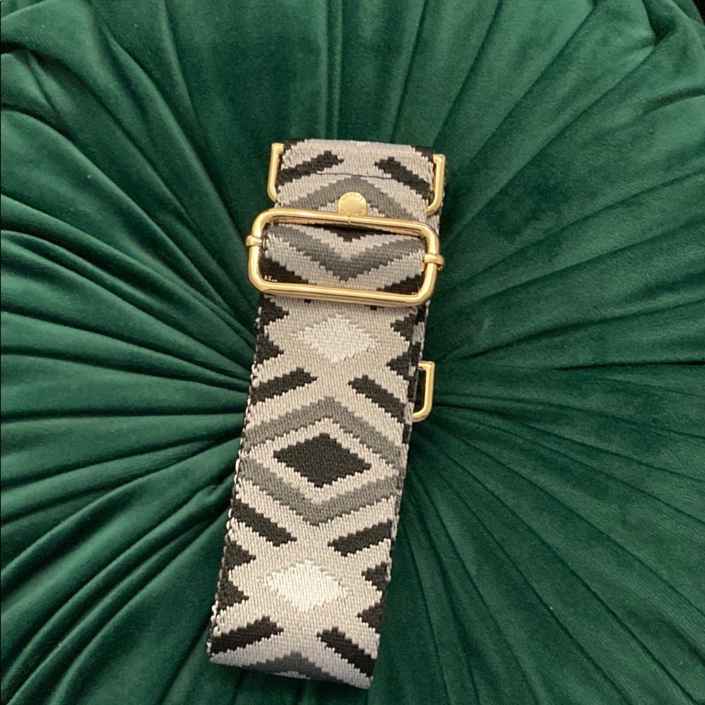 Pom Pom London Black and Gray Patterned Crossbody Strap.